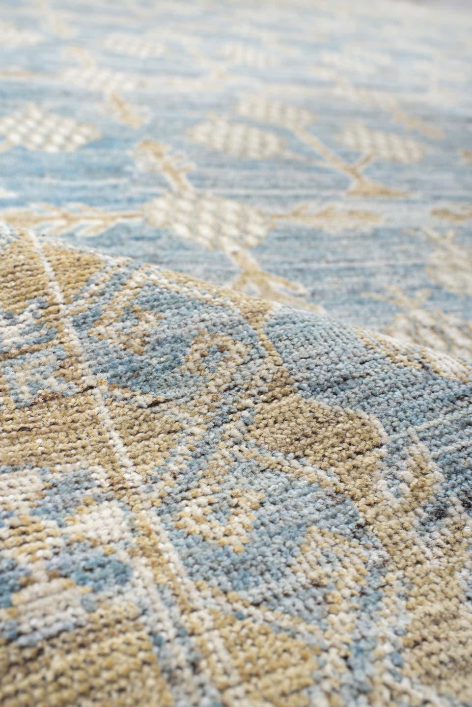 8' x 10' one-of-a-kind handmade vintage Khotan large size rug. Color palette: pale blue, ivory, cream, beige, light gold