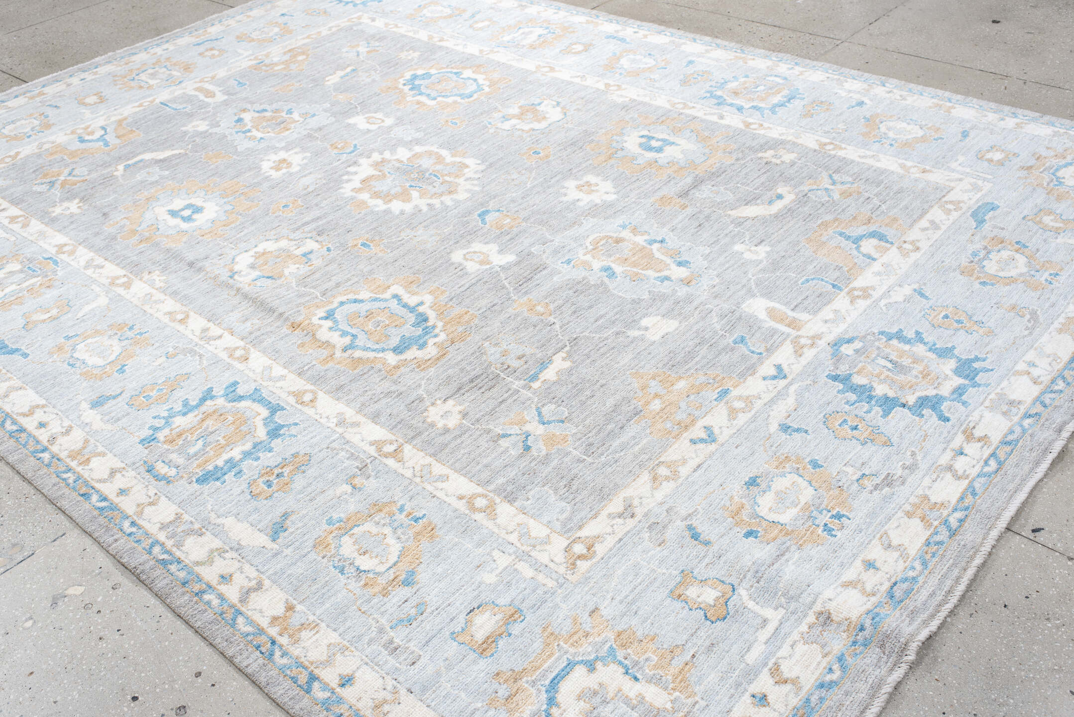 8' x 11' one-of-a-kind handmade vintage Oushak large size rug. Color palette: light gray, ivory, sky blue, beige, taupe
