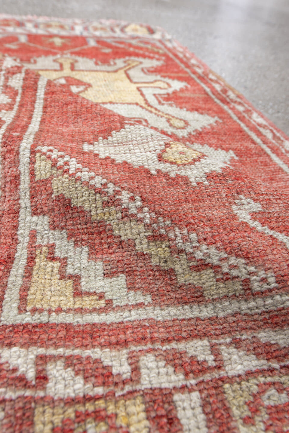 1' x 3' one-of-a-kind handmade antique Anatolian small size rug. Color palette: rust, ivory, cream, terracotta, pale blue