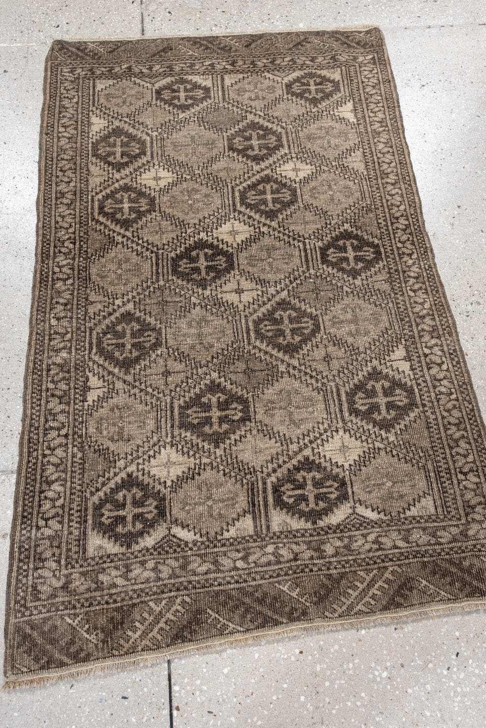 2' x 4' one-of-a-kind handmade antique Afghan small size rug. Color palette: taupe, brown, ivory, charcoal, camel, beige
