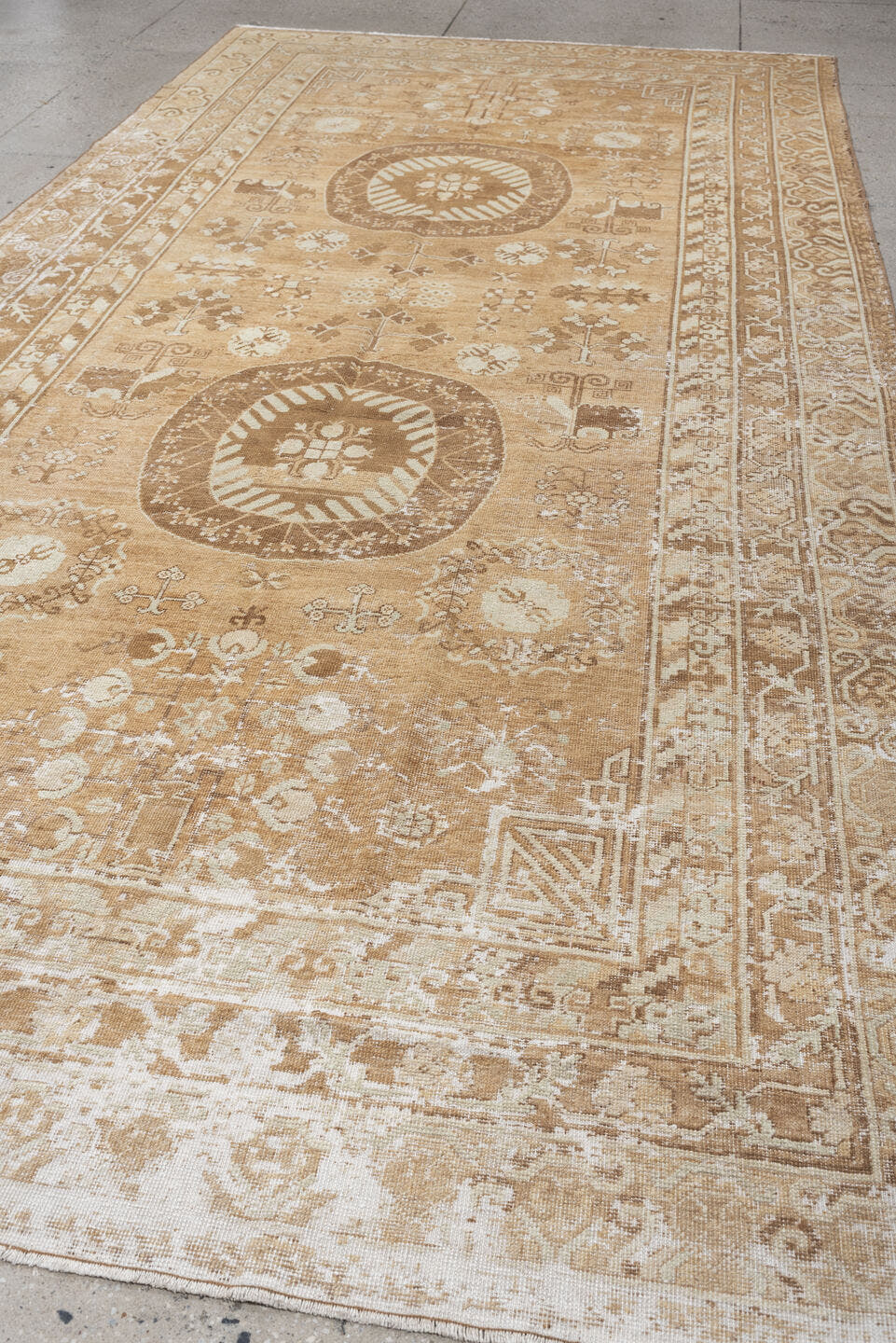 6' x 10' one-of-a-kind handmade antique Khotan large size rug. Color palette: camel, ivory, sand, taupe, beige, warm gray