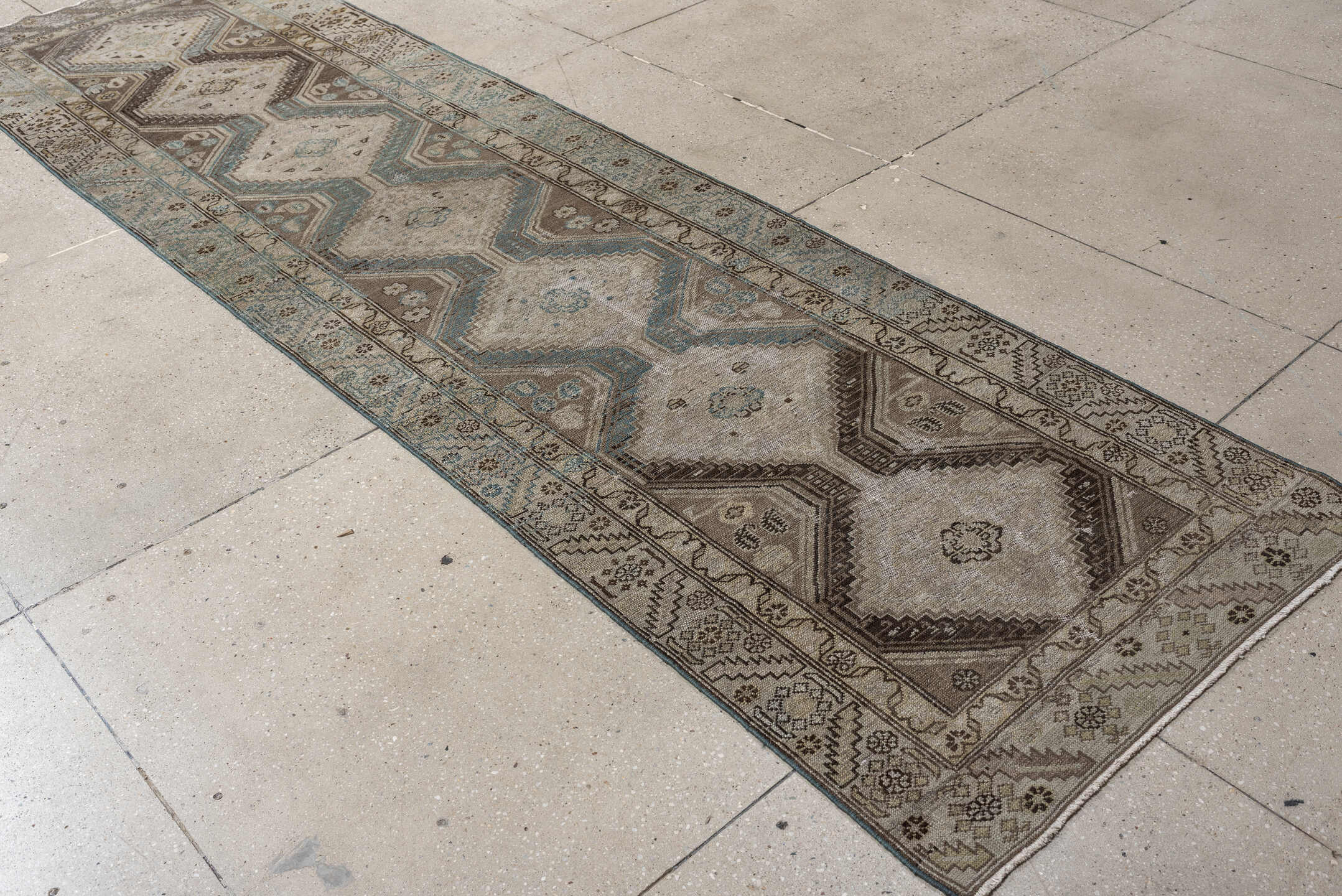 3' x 11' one-of-a-kind handmade antique Malayer runner rug. Color palette: ivory, taupe, sky blue, brown, camel, charcoal