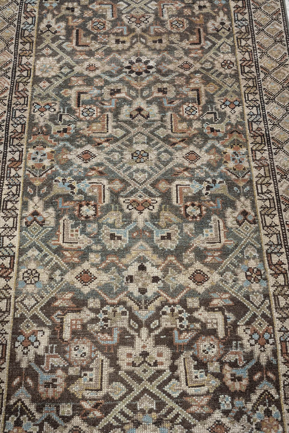 2' x 18' one-of-a-kind handmade antique runner rug. Color palette: blue gray, ivory, camel, charcoal, rust, taupe, sage