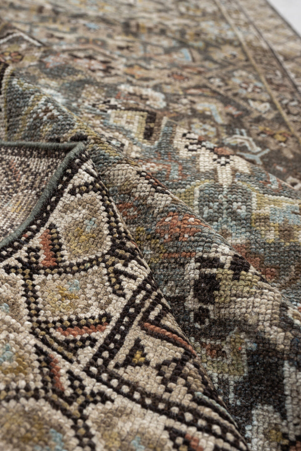 2' x 18' one-of-a-kind handmade antique runner rug. Color palette: blue gray, ivory, camel, charcoal, rust, taupe, sage