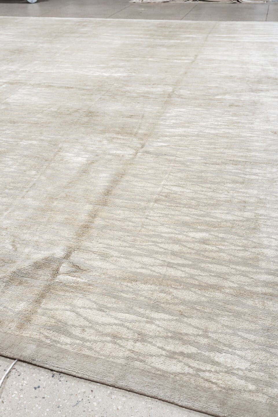 14' x 15' one-of-a-kind handmade antique Tibetan oversize rug. Color palette: ivory, pale gray, taupe, beige, light gray