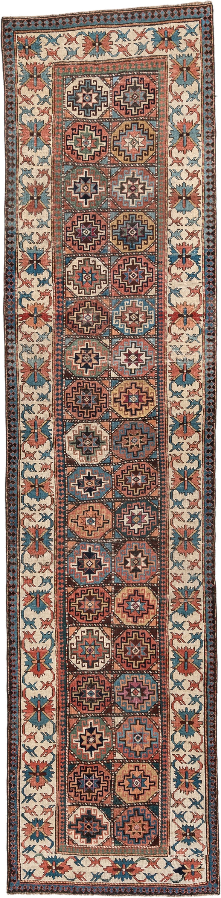3' x 13' one-of-a-kind handmade antique Caucasian runner rug. Color palette: indigo, ivory, rust, coral, teal, charcoal