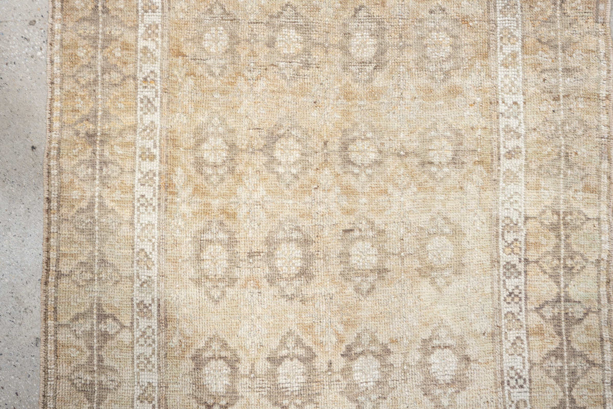 2' x 6' one-of-a-kind handmade antique Caucasian runner rug. Color palette: ivory, beige, taupe, brown, camel, gray