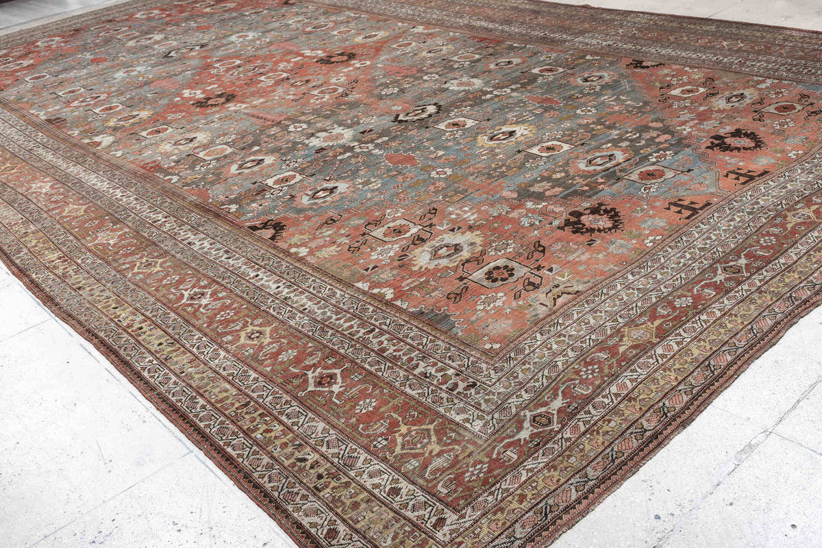 12' x 22' one-of-a-kind handmade antique Bidjar oversize rug. Color palette: terracotta, blue gray, ivory, rust, coral