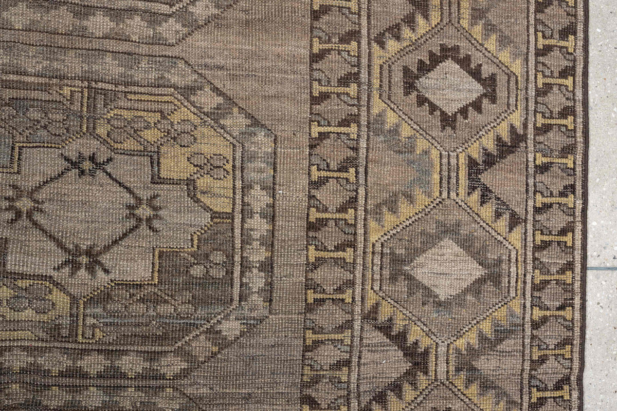 10' x 14' one-of-a-kind handmade antique Afshar rug. Color palette: taupe, camel, ivory, charcoal, blue gray, ochre, ebony