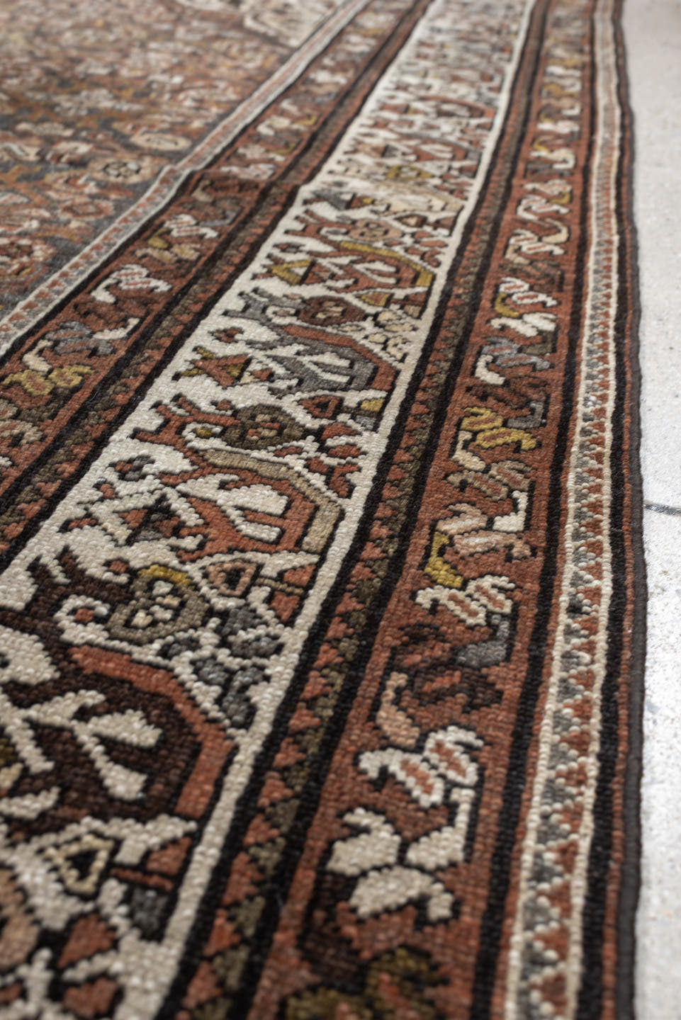 5' x 6' one-of-a-kind handmade antique Malayer rug. Color palette: ivory, rust, dark brown, indigo, slate blue, taupe, olive