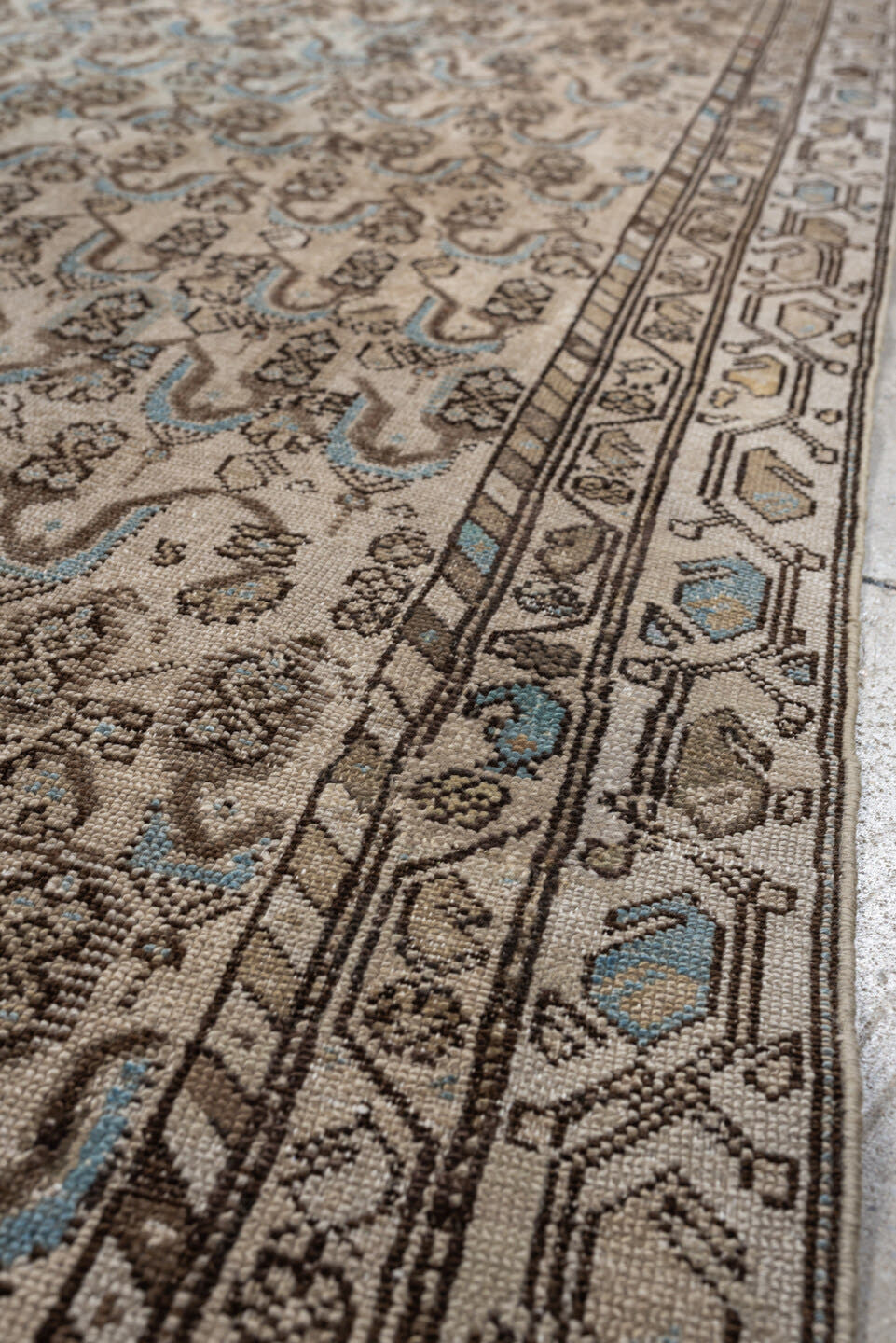 4' x 8' one-of-a-kind handmade antique Malayer medium size rug. Color palette: ivory, taupe, brown, sky blue, camel, rust