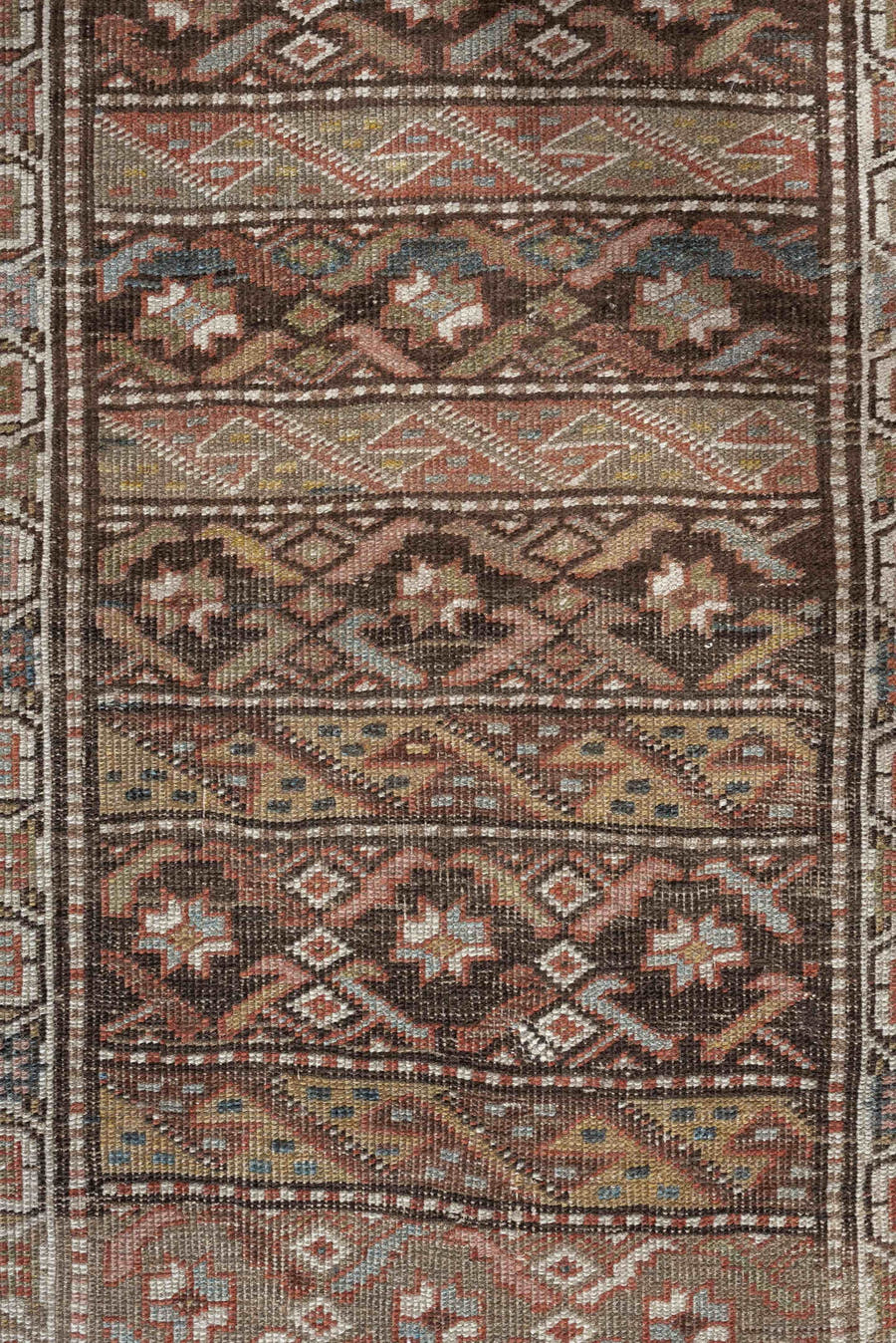 2' x 9' one-of-a-kind handmade antique Bidjar runner rug. Color palette: brown, ivory, rust, sky blue, taupe, camel