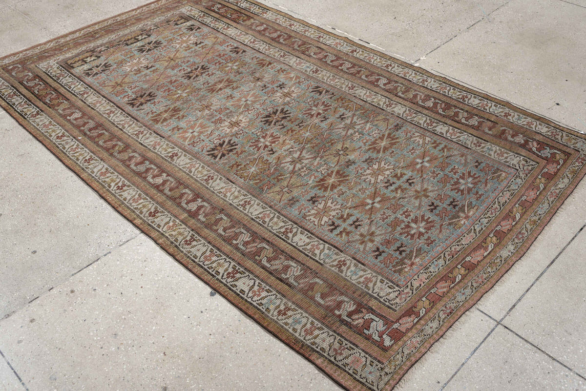 4' x 7' one-of-a-kind handmade antique Bidjar rug. Color palette: pale blue, rust, ivory, camel, taupe, brown, charcoal