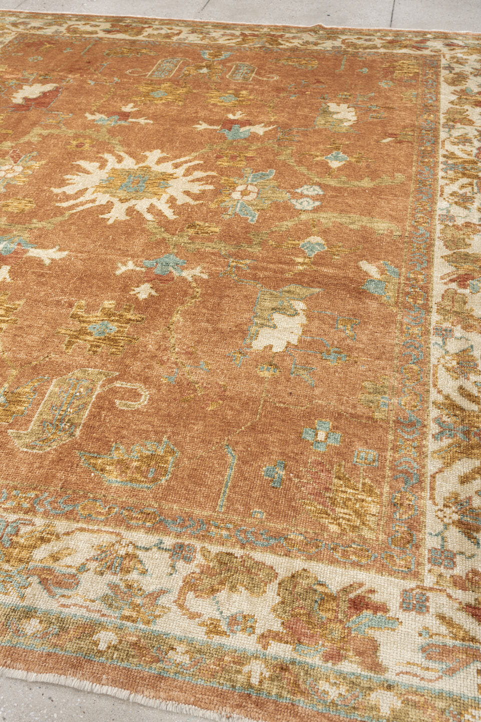 8' x 9' one-of-a-kind handmade antique Oushak large size rug. Color palette: terra cotta, ivory, sage, light blue, gold