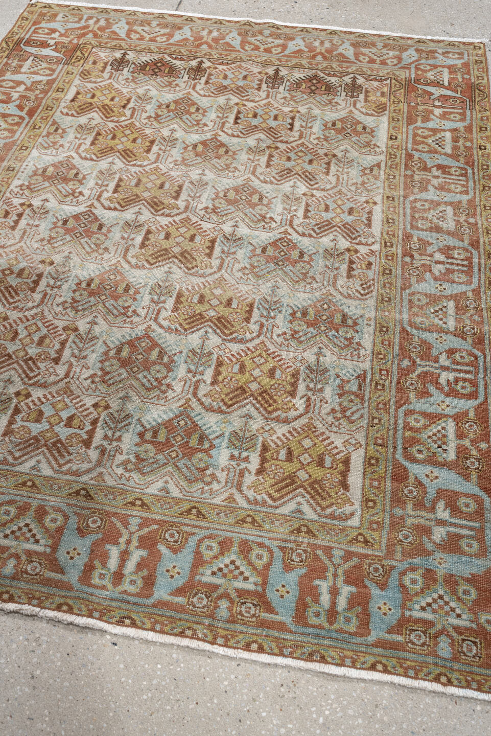 4' x 5' one-of-a-kind handmade antique Afshar small size rug. Color palette: ivory, terra cotta, pale blue, camel, taupe