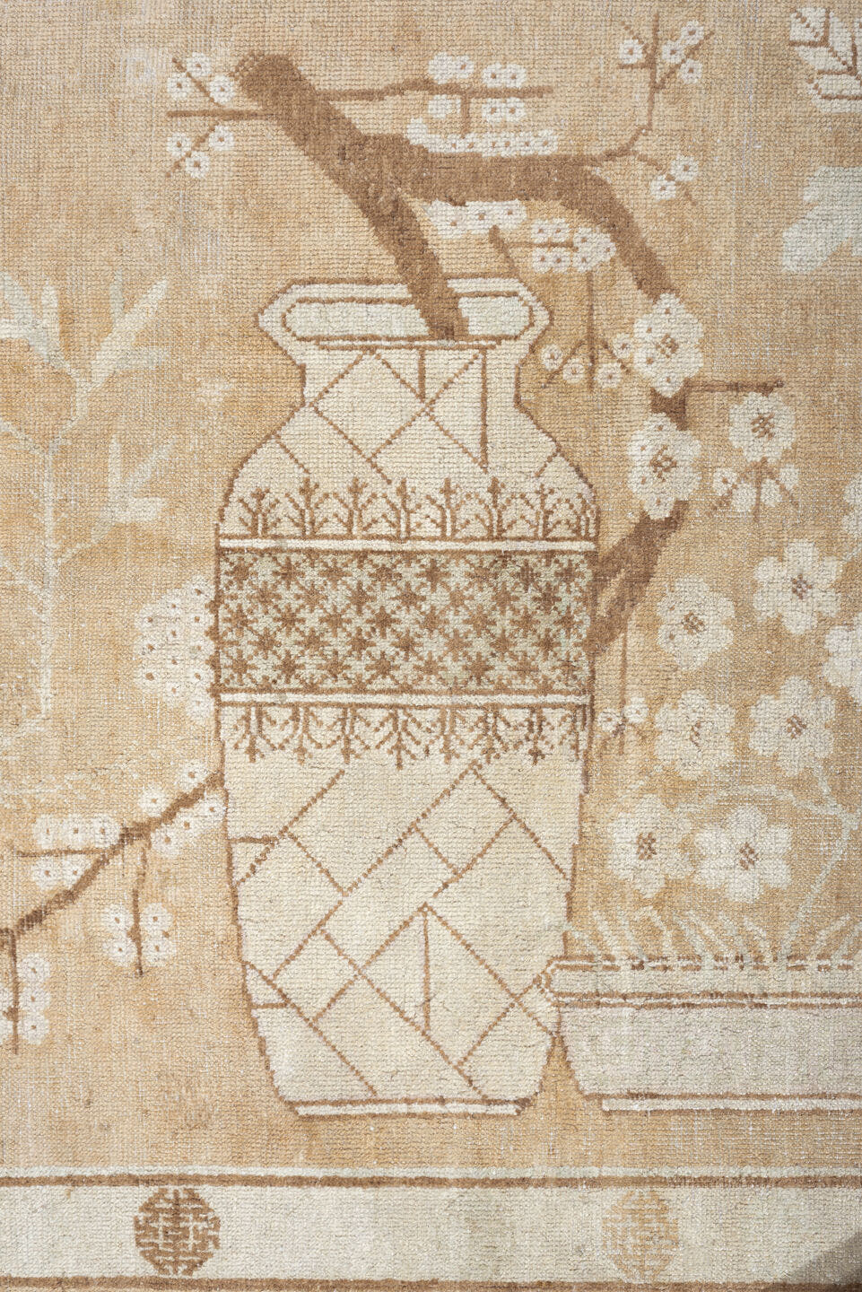 5' x 9' one-of-a-kind handmade antique Khotan medium size rug. Color palette: ivory, sand, celadon, beige, taupe, camel