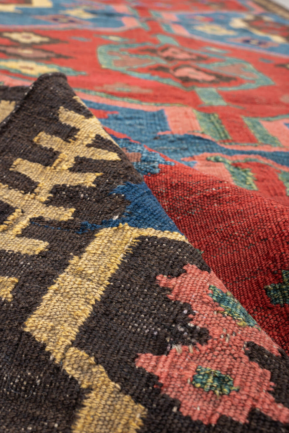 4' x 9' one-of-a-kind handmade antique Kilim medium size rug. Color palette: rust, blue, ivory, charcoal, rose, olive, teal