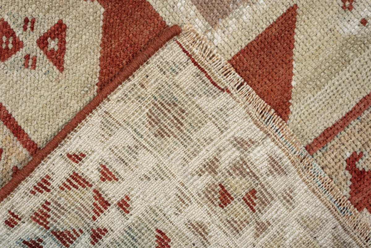 3' x 10' one-of-a-kind handmade vintage Caucasian runner rug. Color palette: ivory, terracotta, rust, blue gray, taupe