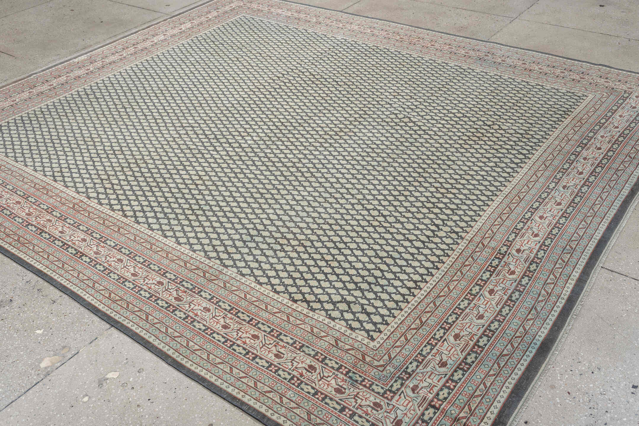 8' x 9' one-of-a-kind handmade antique Mir large size rug. Color palette: ivory, pale blue, rust, charcoal, taupe