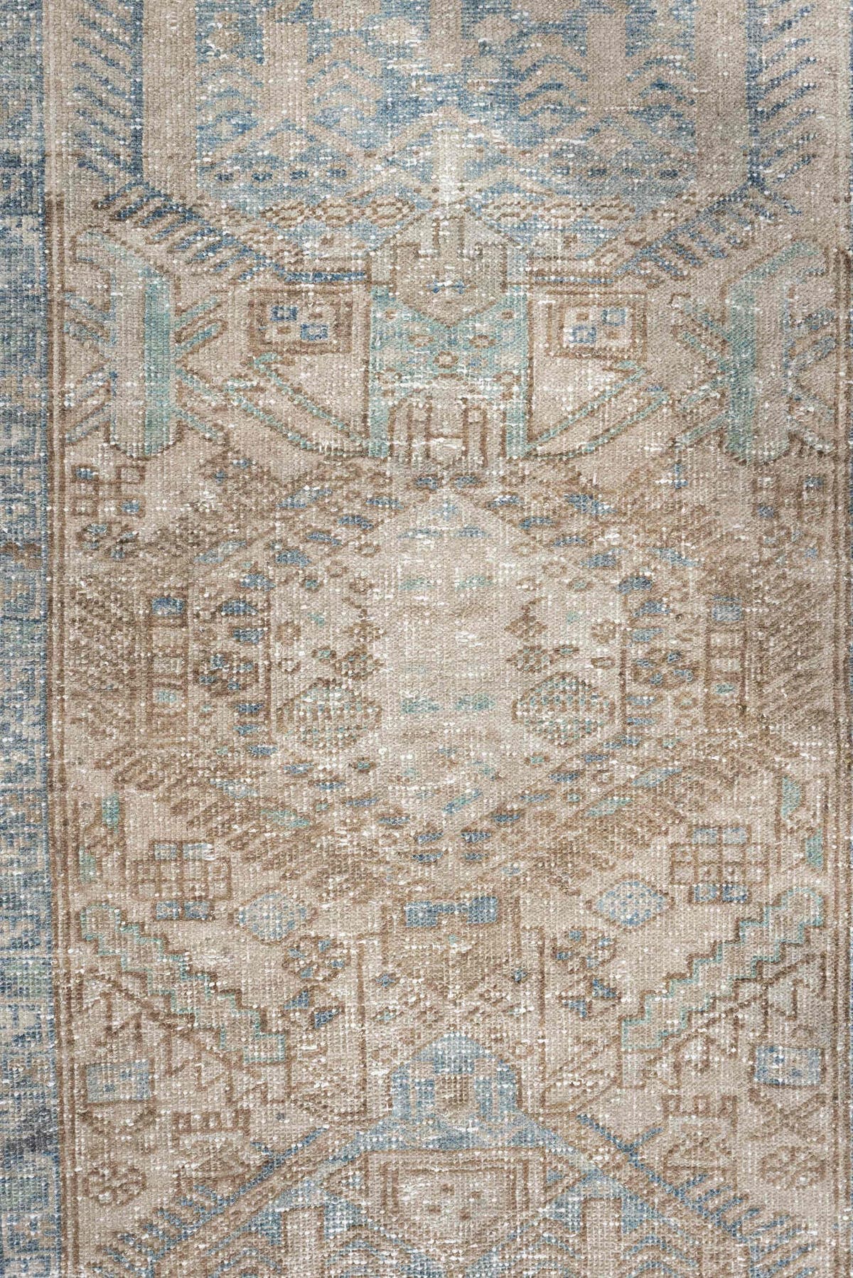 3' x 11' one-of-a-kind handmade antique Heriz runner rug. Color palette: ivory, pale blue, beige, taupe, camel, light blue