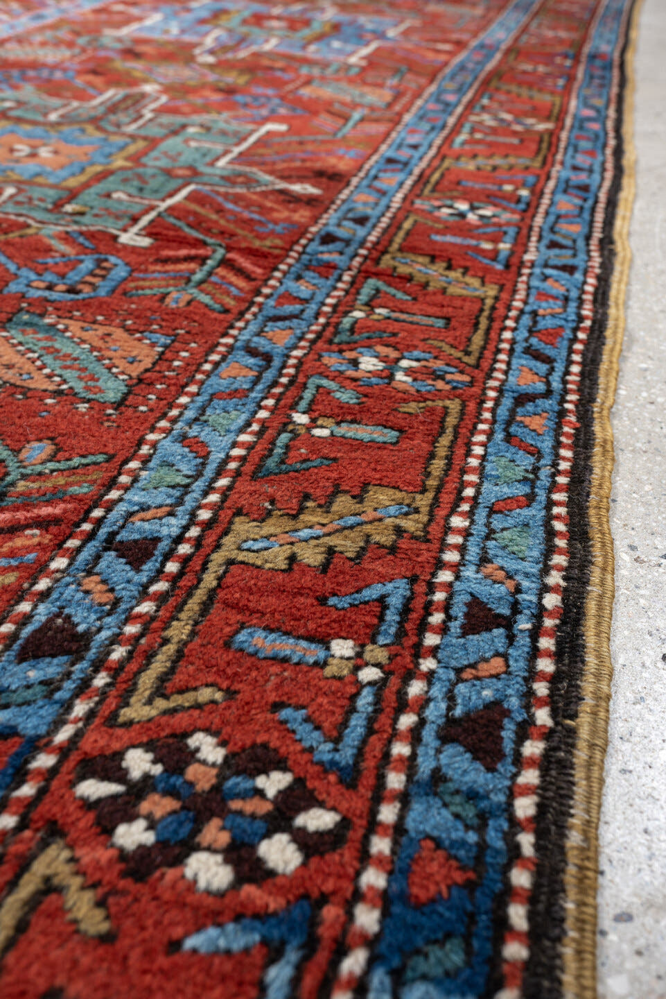 3' x 10' one-of-a-kind handmade antique Heriz runner rug. Color palette: rust, turquoise, sky blue, ivory, coral, navy, sage