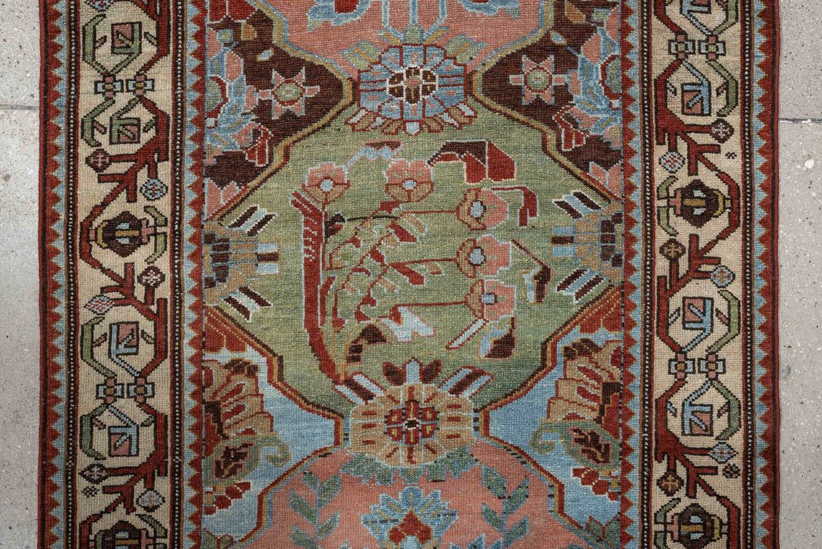3' x 9' one-of-a-kind handmade antique Baktiary runner rug. Color palette: rose, ivory, pale blue, sage, rust, brown, taupe
