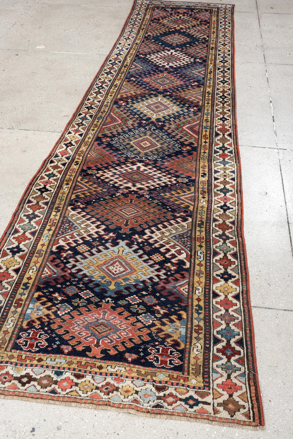 2' x 11' one-of-a-kind handmade antique NW Persian runner rug. Color palette: navy, ivory, rust, camel, terracotta