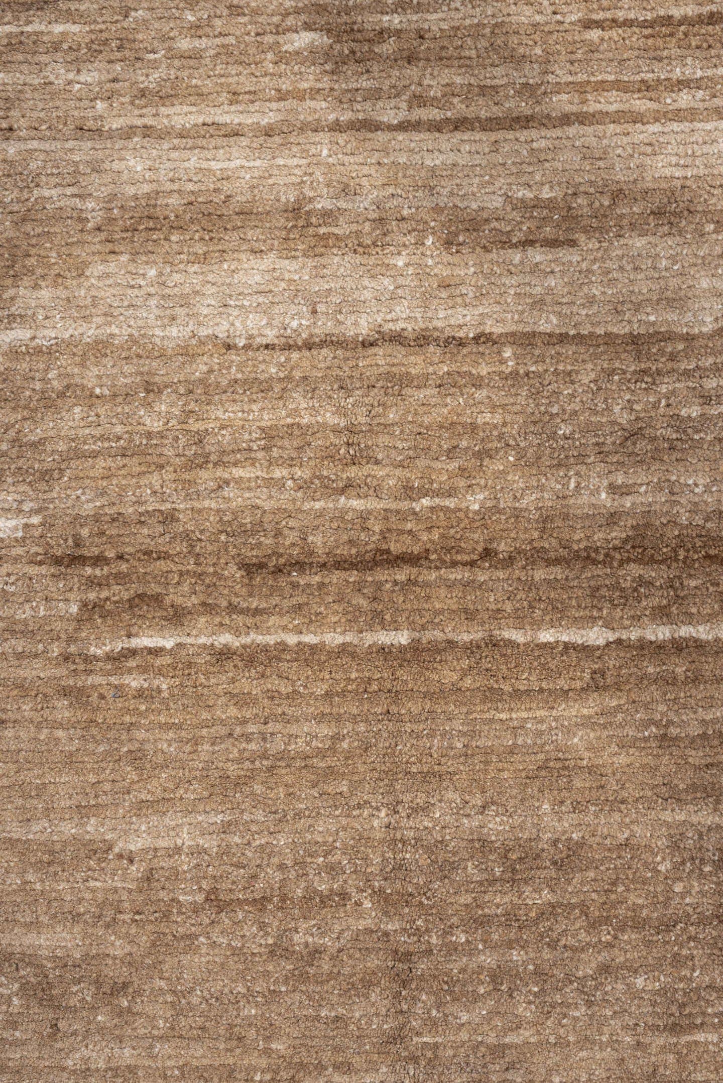 7' x 9' one-of-a-kind handmade vintage Tibetan rug. Color palette: camel, ivory, taupe, beige, cream, gray
