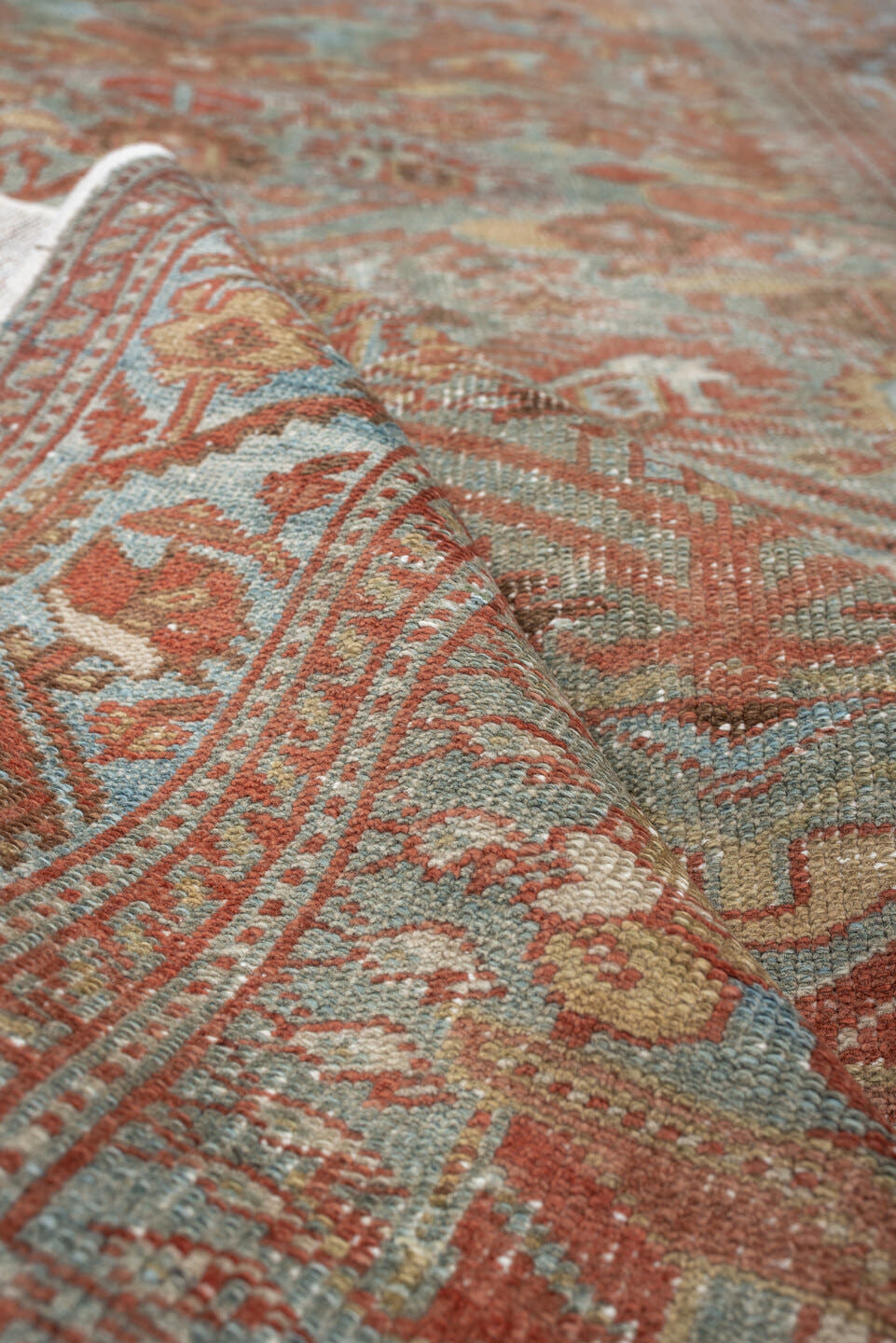 4' x 6' one-of-a-kind handmade antique Farahan small size rug. Color palette: light blue, rust, camel, brown, ivory, taupe