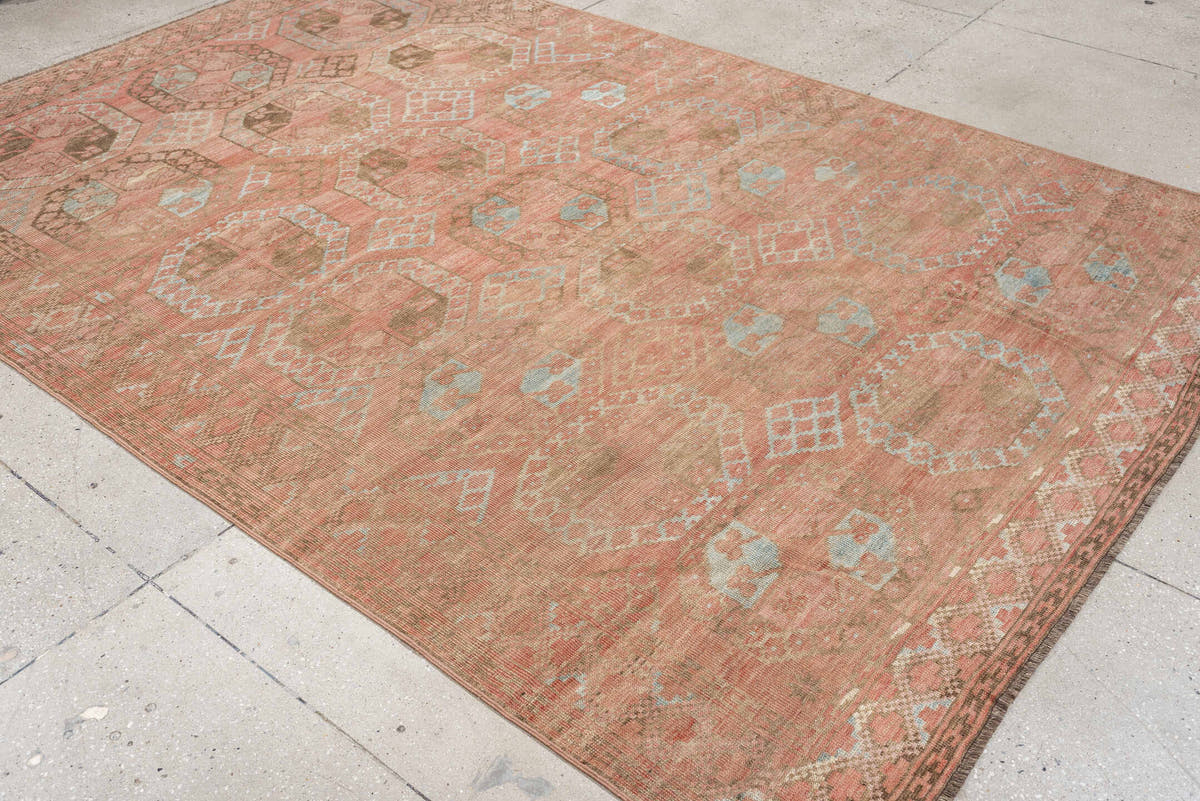 6' x 9' one-of-a-kind handmade antique Afghan large size rug. Color palette: coral, camel, pale blue, taupe, ivory, rose