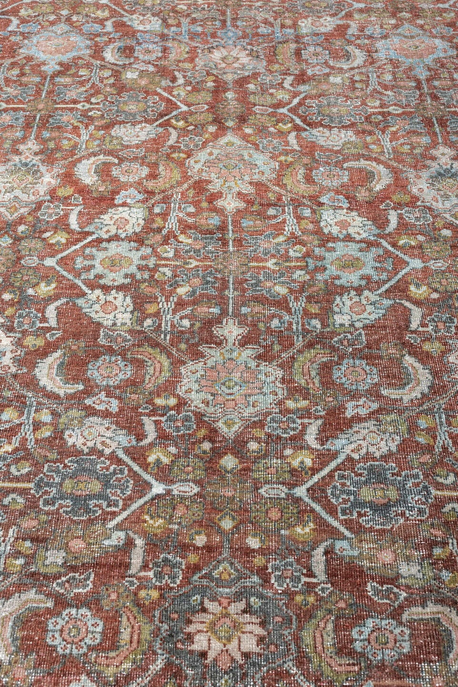 9' x 12' one-of-a-kind handmade antique Mahal large size rug. Color palette: rust, celadon, charcoal, ivory, sage
