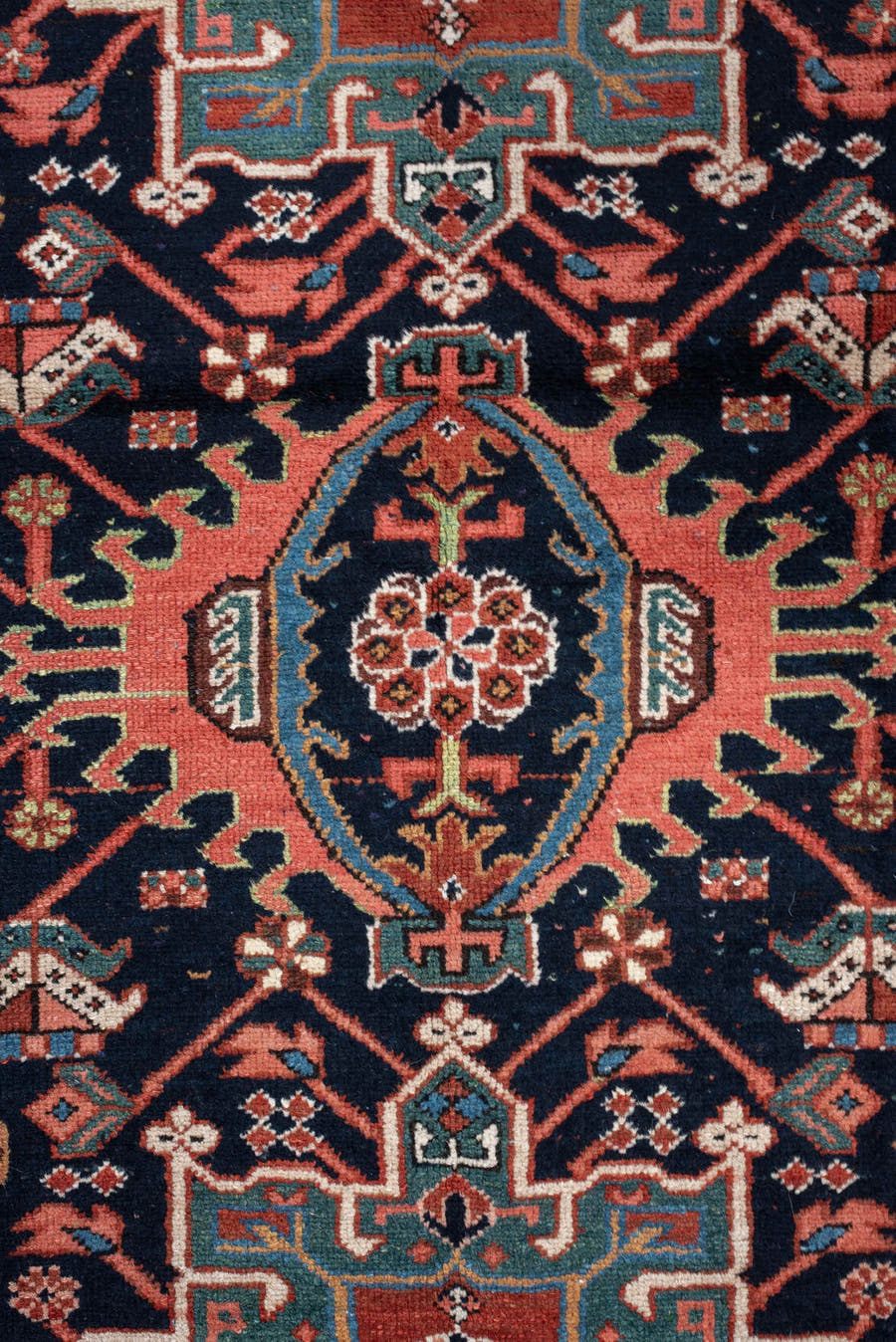 4' x 6' one-of-a-kind handmade antique Karaje rug. Color palette: rust, navy, sky blue, ivory, coral, camel, sage, charcoal