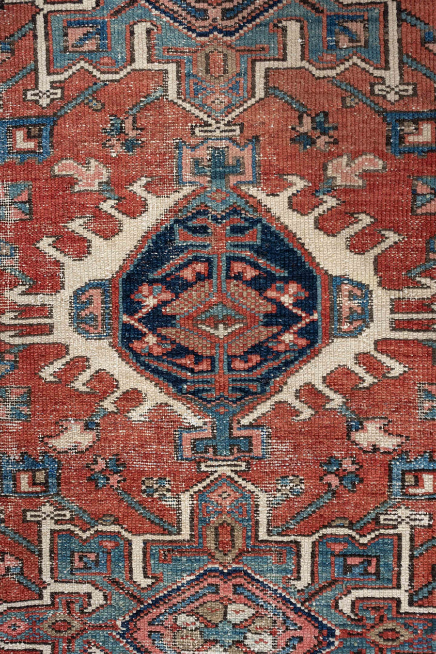 3' x 4' one-of-a-kind handmade antique Karaje small size rug. Color palette: terracotta, navy, ivory, light blue, rust