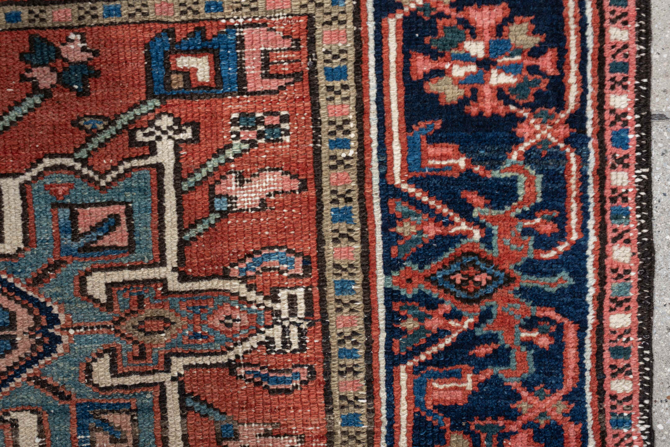 3' x 4' one-of-a-kind handmade antique Karaje small size rug. Color palette: terracotta, navy, ivory, light blue, rust