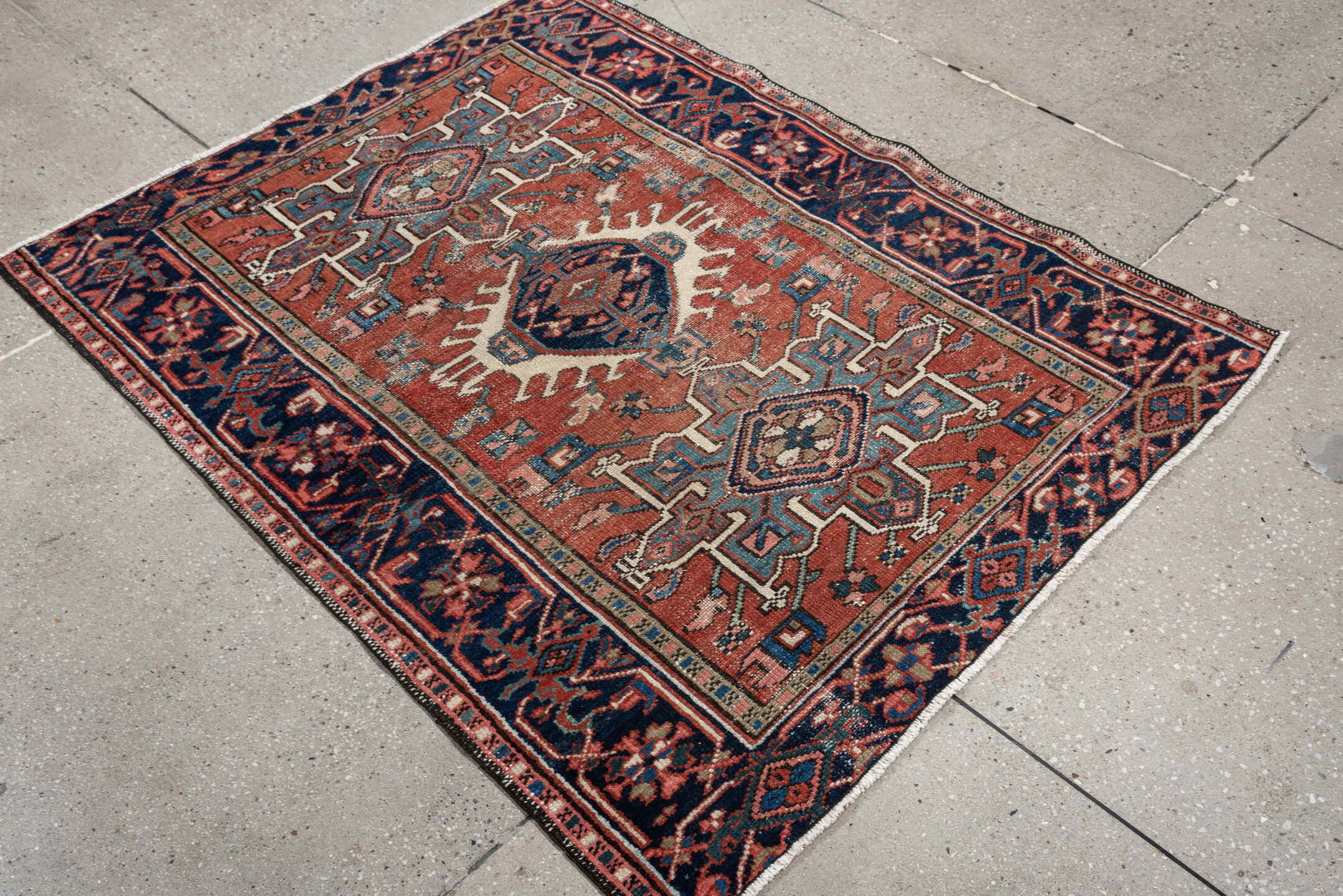 3' x 4' one-of-a-kind handmade antique Karaje small size rug. Color palette: terracotta, navy, ivory, light blue, rust