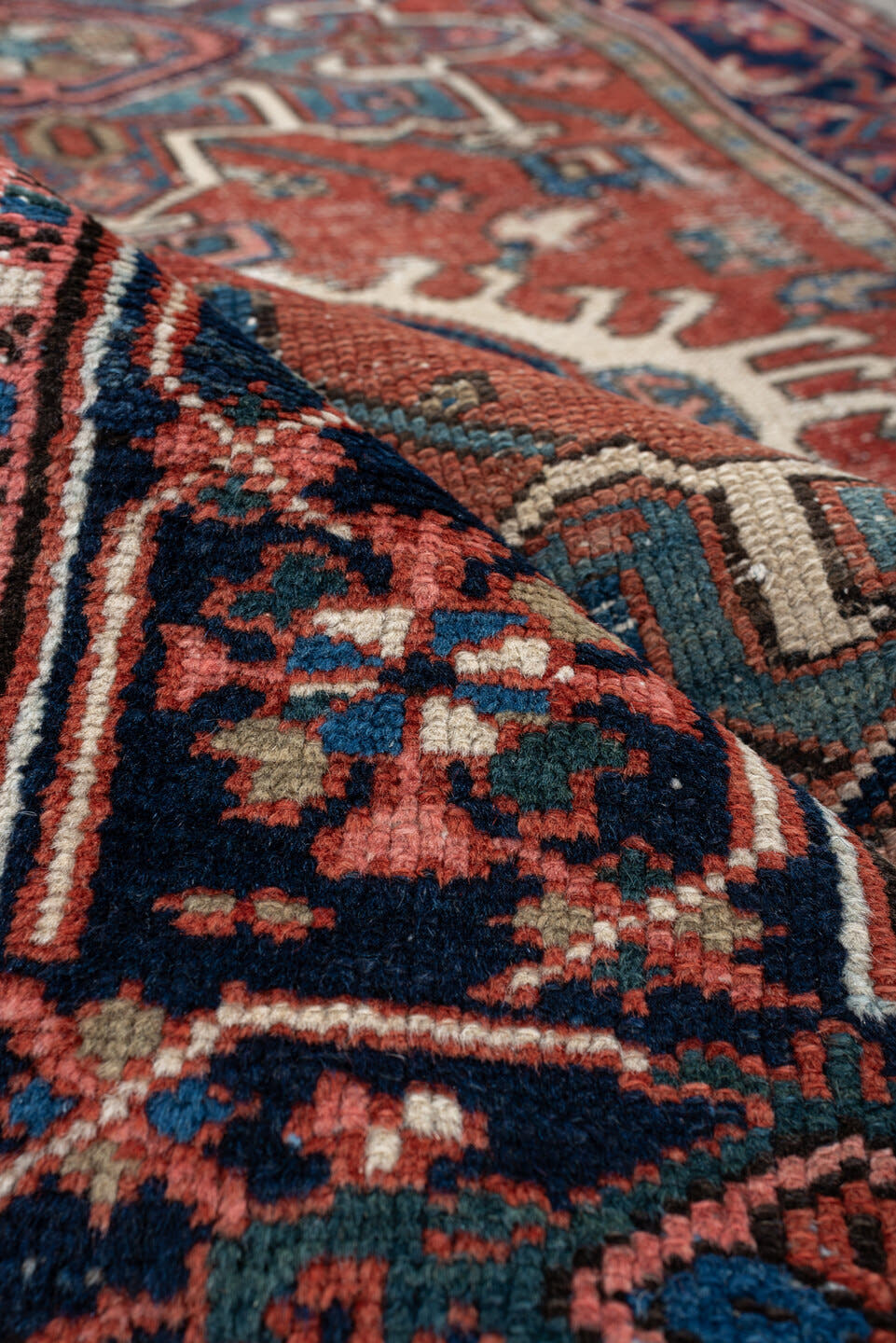 3' x 4' one-of-a-kind handmade antique Karaje small size rug. Color palette: terracotta, navy, ivory, light blue, rust