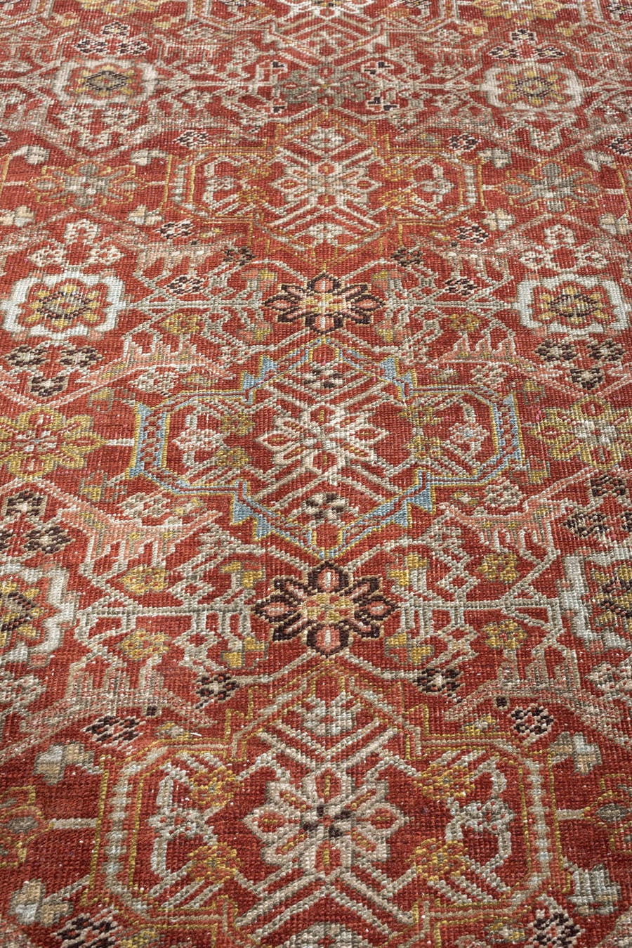 8' x 11' one-of-a-kind handmade antique Heriz large size rug. Color palette: rust, powder blue, ivory, terracotta, taupe