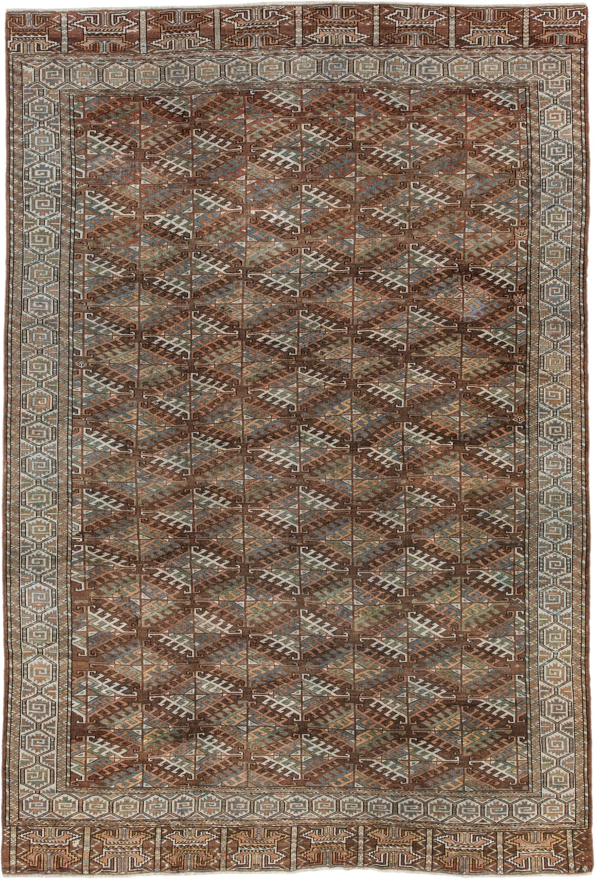 7' x 10' one-of-a-kind handmade antique Yamoud large size rug. Color palette: brown, camel, ivory, muted teal, rust, taupe