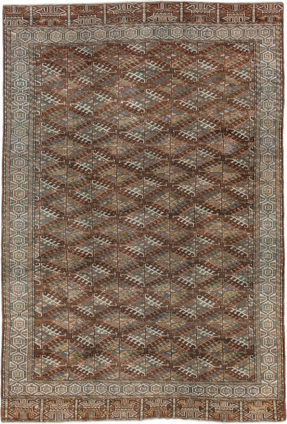 7' x 10' one-of-a-kind handmade antique Yamoud large size rug. Color palette: brown, camel, ivory, muted teal, rust, taupe