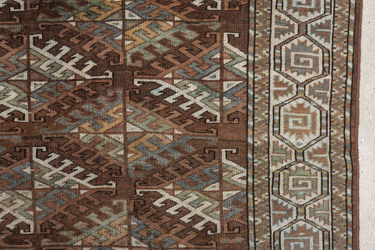7' x 10' one-of-a-kind handmade antique Yamoud large size rug. Color palette: brown, camel, ivory, muted teal, rust, taupe