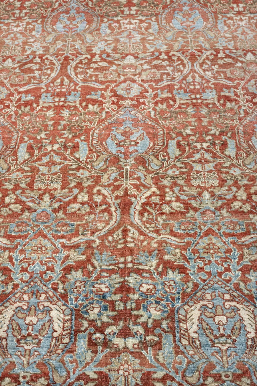 9' x 12' one-of-a-kind handmade antique Baktiary large size rug. Color palette: rust, sky blue, ivory, sage, terracotta
