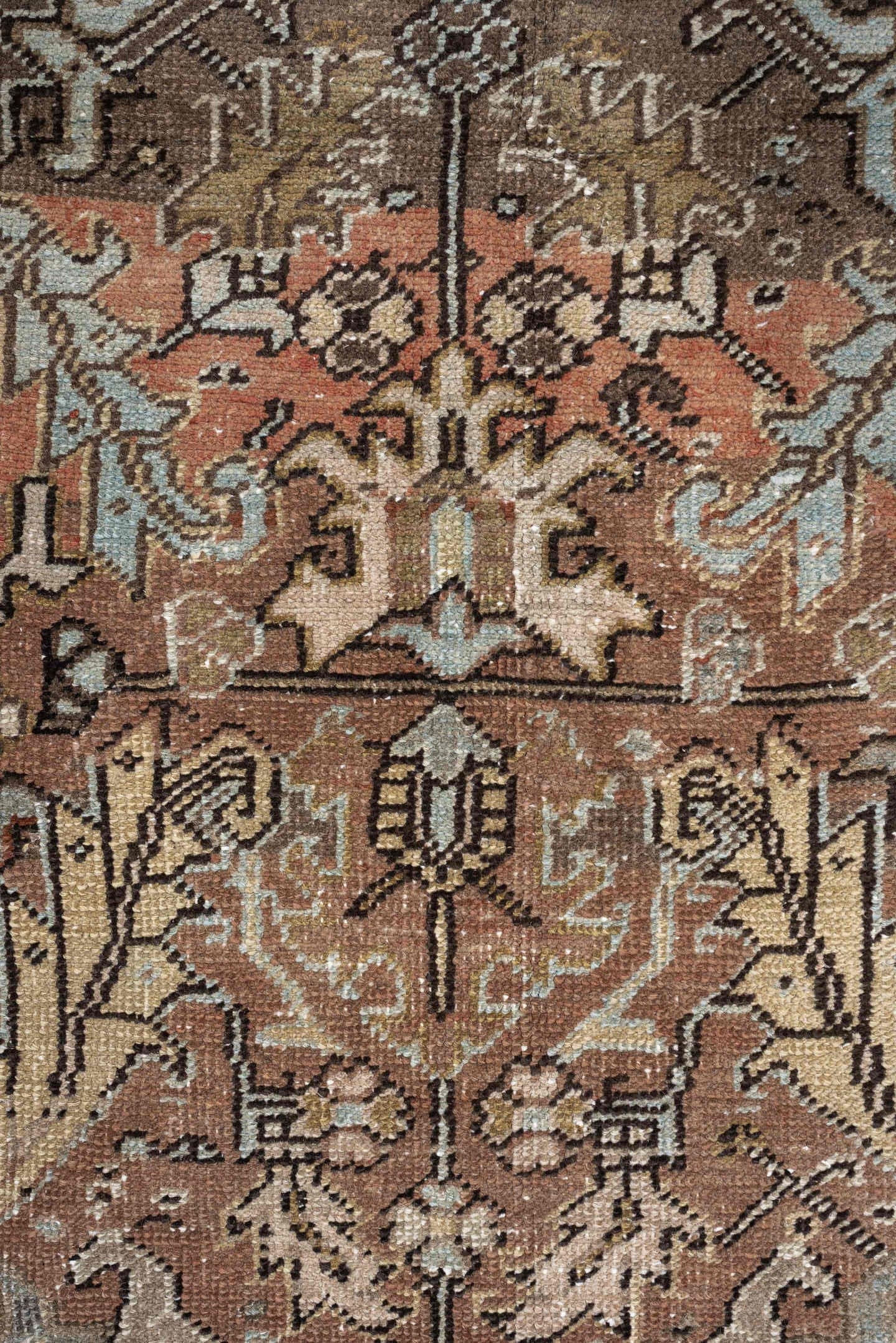 5' x 8' one-of-a-kind handmade antique Heriz medium size rug. Color palette: terra cotta, charcoal, ivory, olive, camel