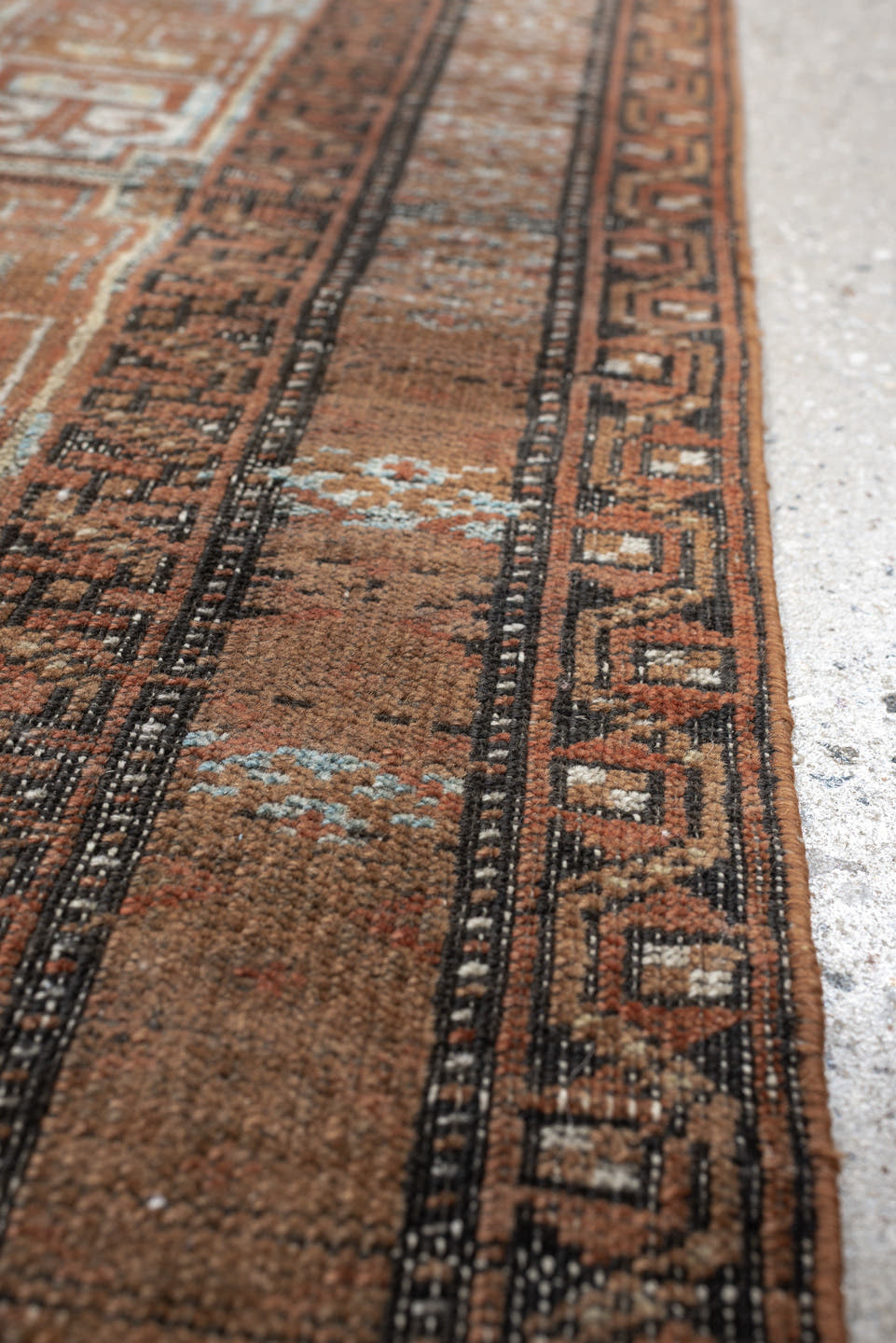 2' x 5' one-of-a-kind handmade antique Belouch small size rug. Color palette: camel, rust, pale blue, ivory, charcoal, taupe