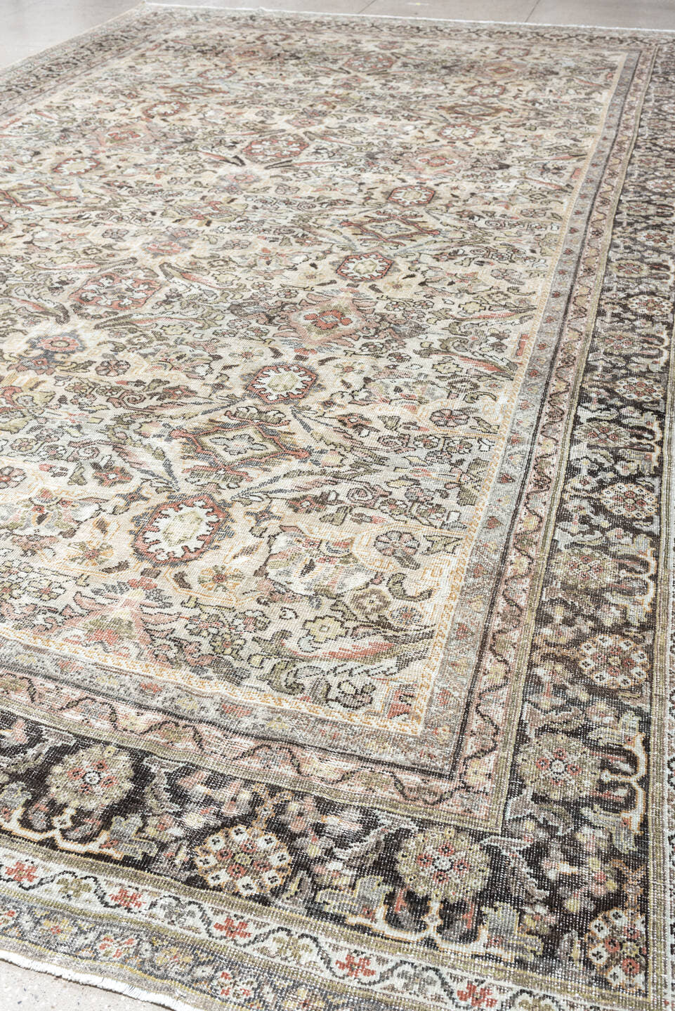 10' x 17' one-of-a-kind handmade antique Mahal oversize rug. Color palette: ivory, charcoal, sage, dusty rose, terracotta
