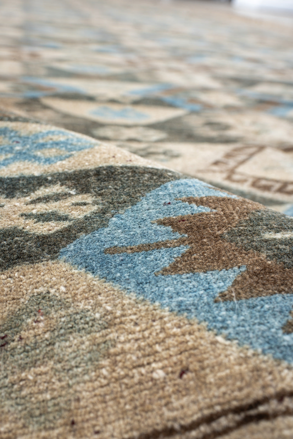 9' x 15' one-of-a-kind handmade vintage Afghan rug. Color palette: black, blue, brown, dim gray, gray, light gray, off-white