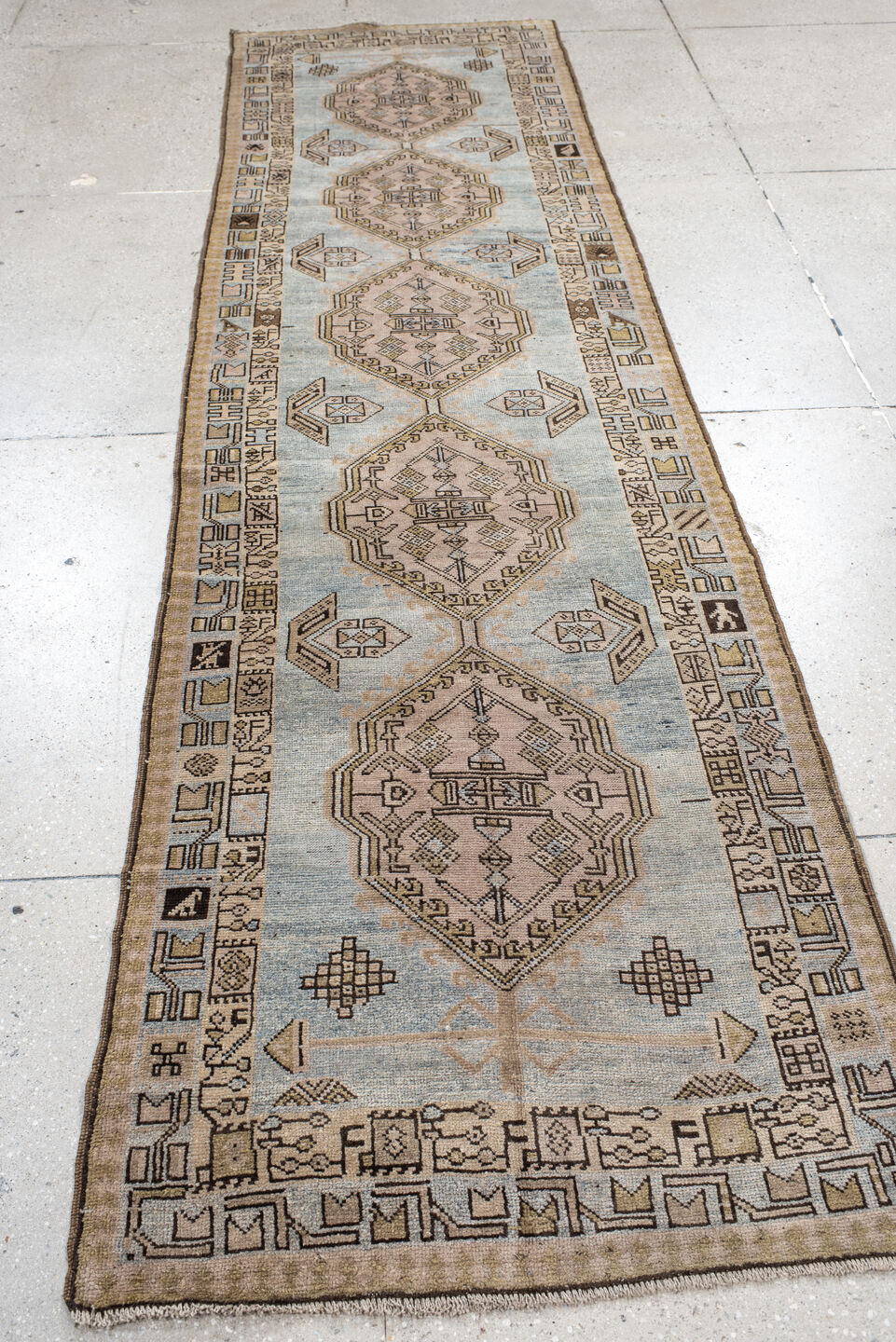 3' x 11' one-of-a-kind handmade vintage Anatolian runner rug. Color palette: ivory, sky blue, taupe, brown, camel, charcoal