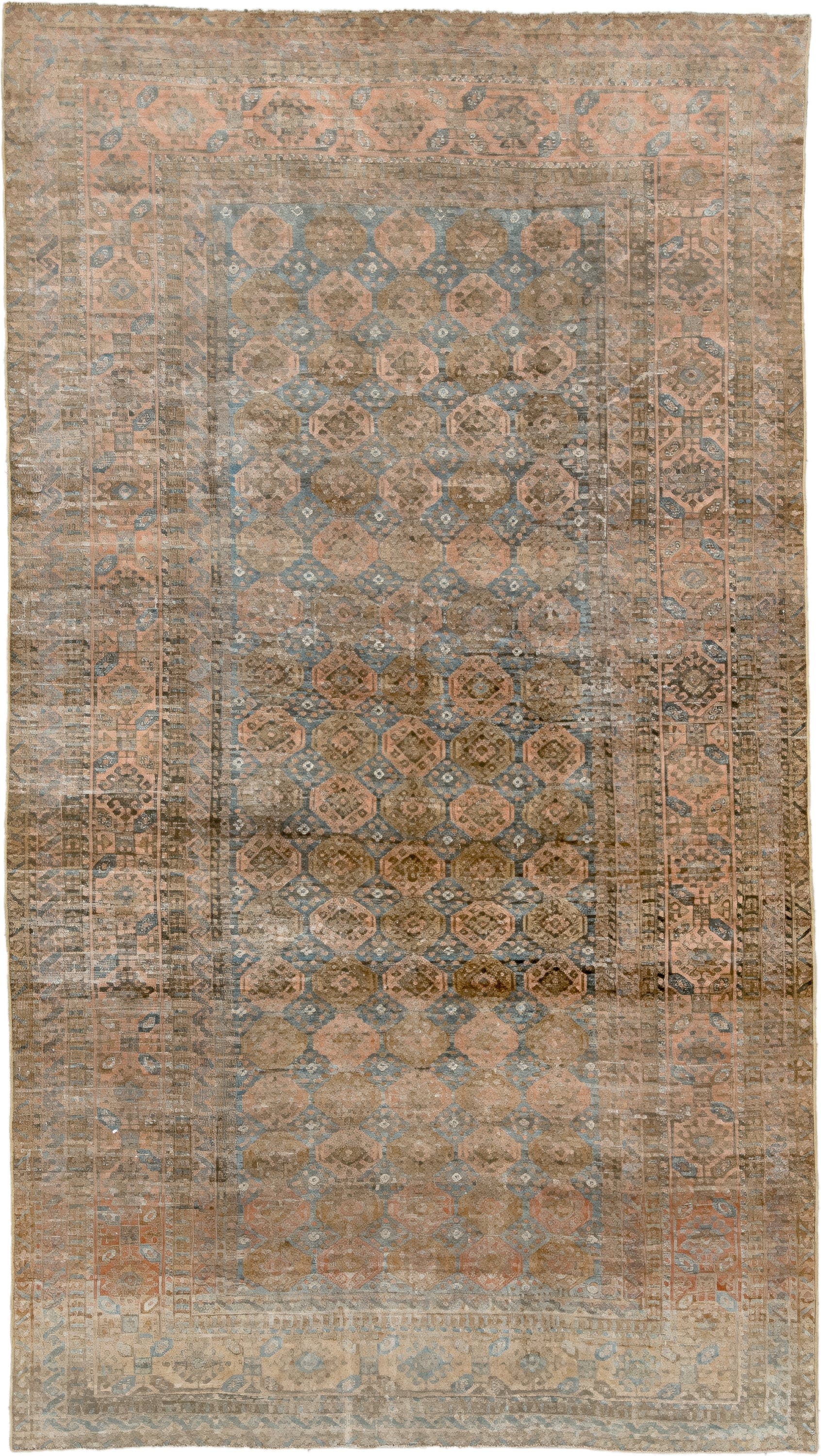 5' x 9' one-of-a-kind handmade antique Belouch medium size rug. Color palette: taupe, camel, dusty blue, beige, brown, ivory