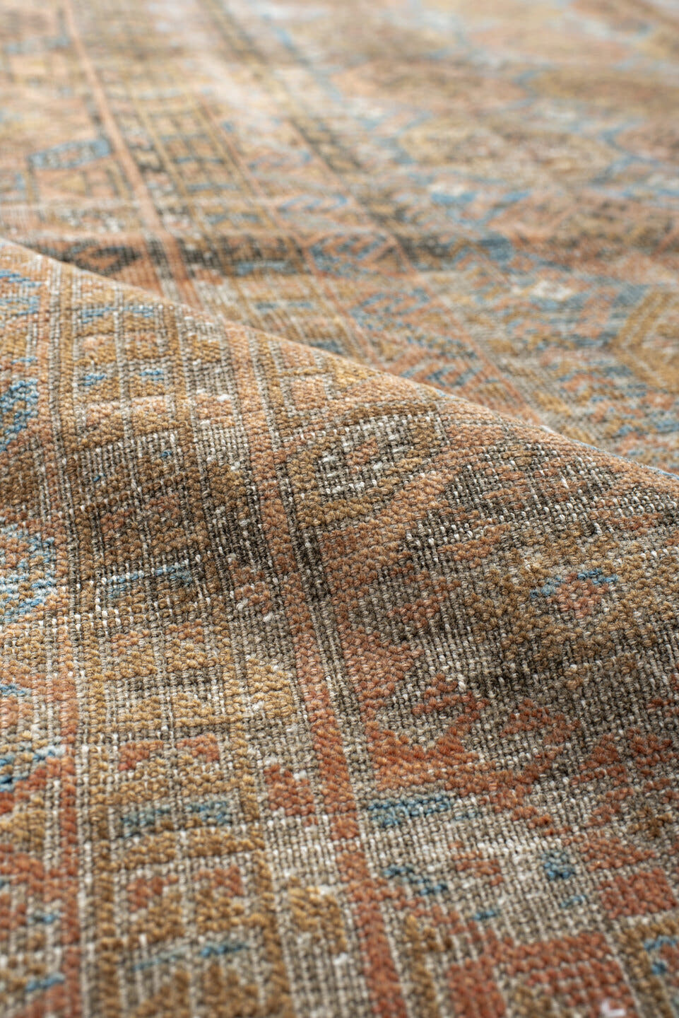 5' x 9' one-of-a-kind handmade antique Belouch medium size rug. Color palette: taupe, camel, dusty blue, beige, brown, ivory