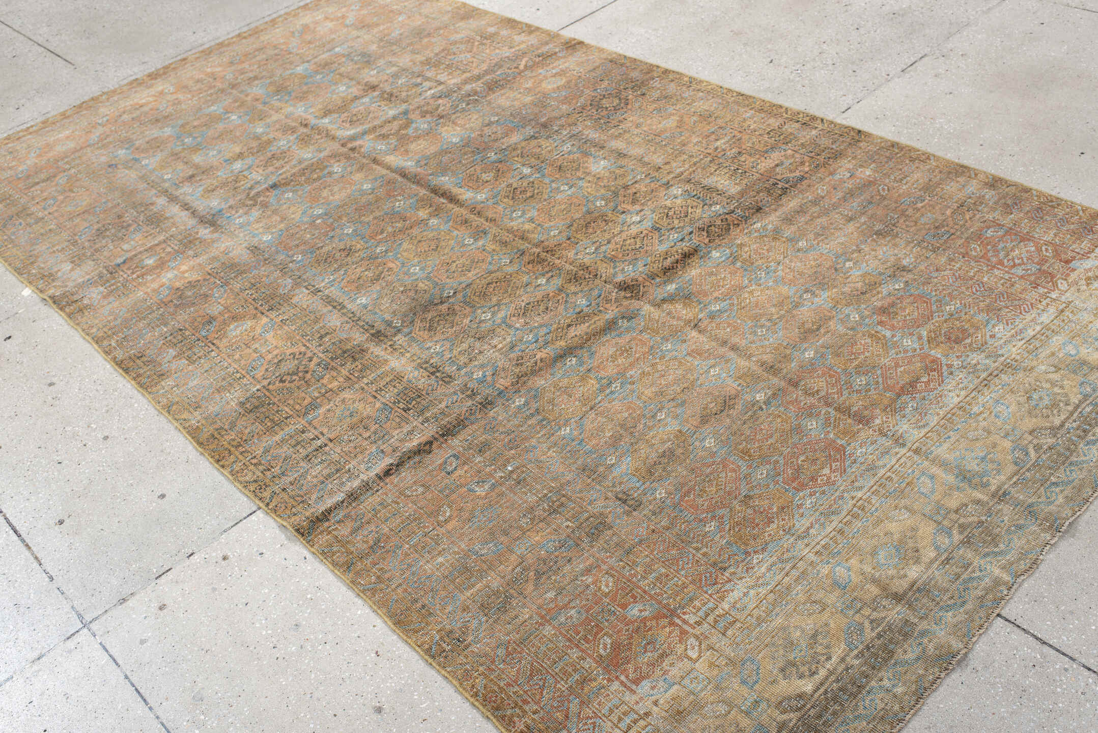 5' x 9' one-of-a-kind handmade antique Belouch medium size rug. Color palette: taupe, camel, dusty blue, beige, brown, ivory