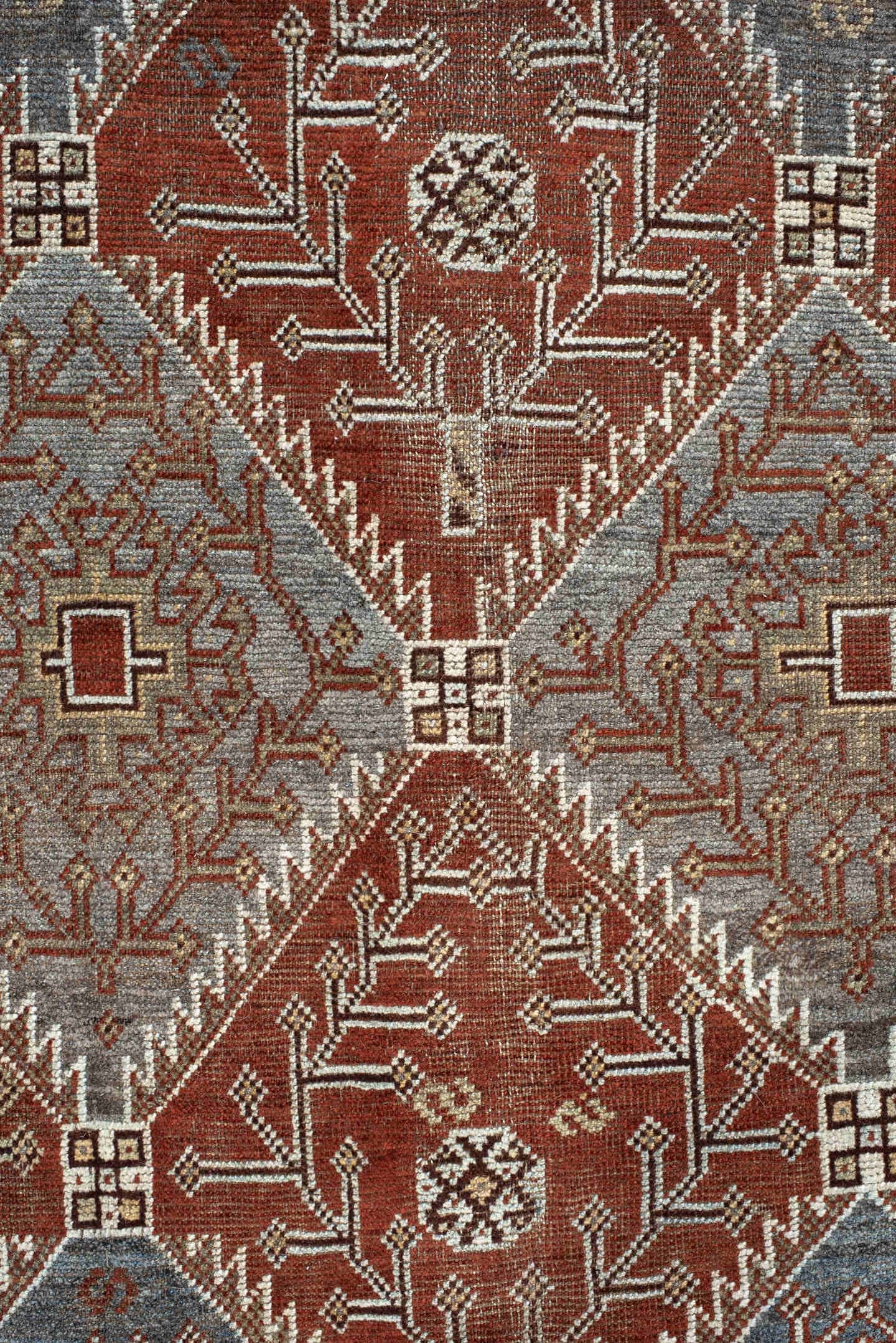 4' x 9' one-of-a-kind handmade antique Shiraz rug. Color palette: rust, sky blue, ivory, brown, taupe, charcoal, terracotta